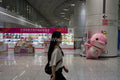 National Games Retail: Commuter Passing Official Licensed Store at Gangxia North (SVA-26-0084)