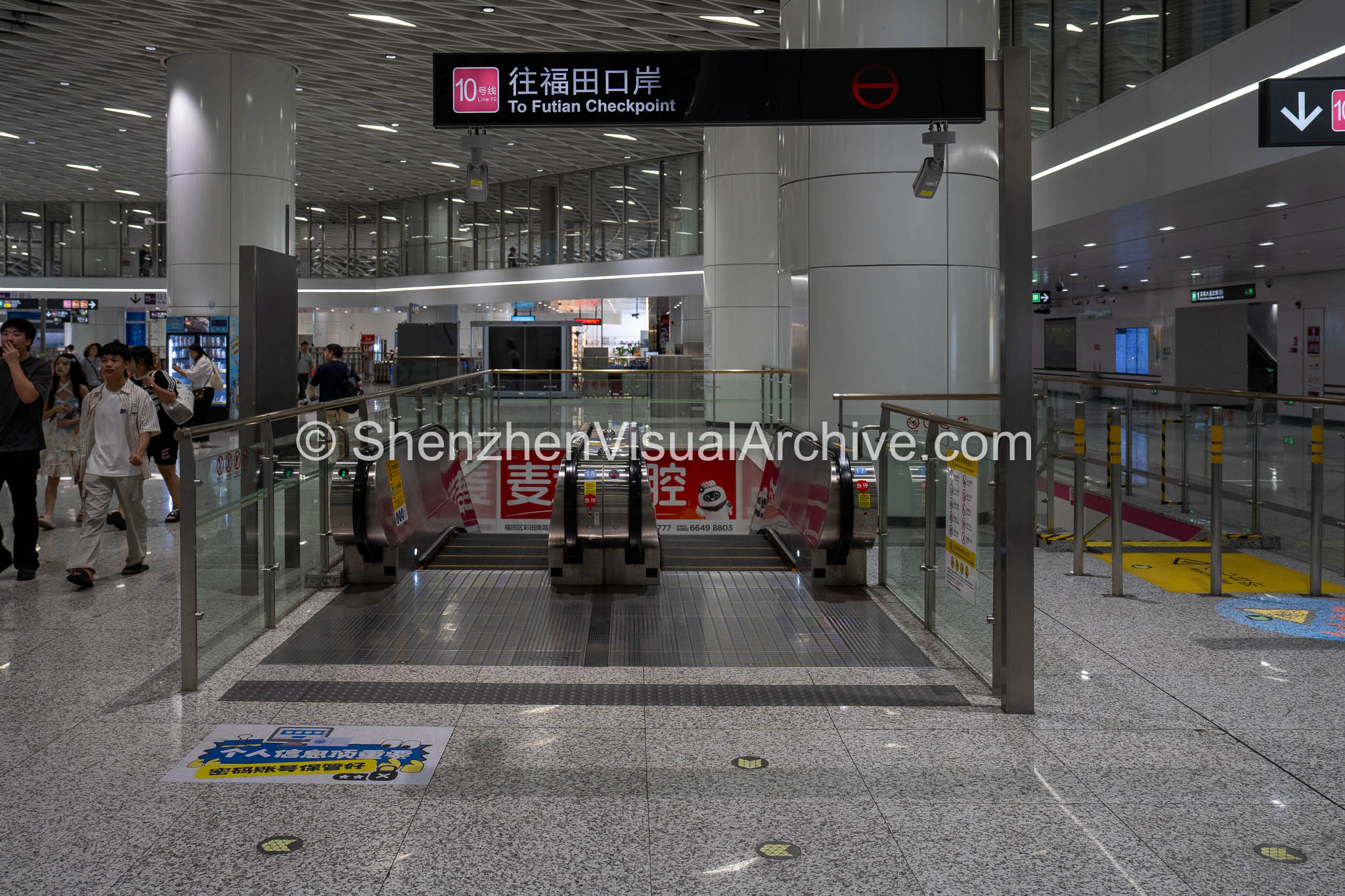 Transit Wayfinding: Escalators and Line 10 Futian Checkpoint Signage at Gangxia North (SVA-26-0092)