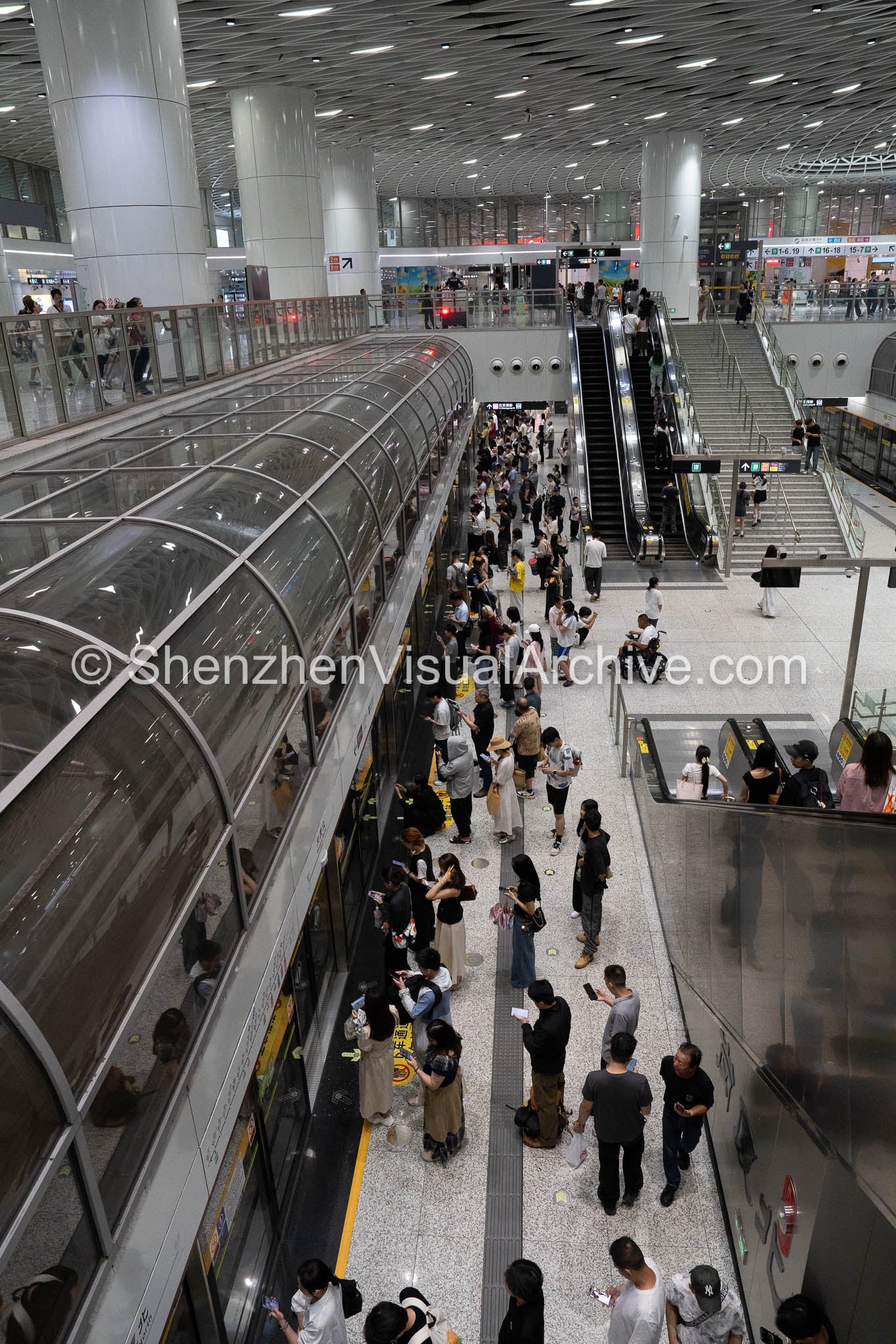 Subterranean Scale: High-Angle View of Commuters at Gangxia North Station (SVA-26-0093)