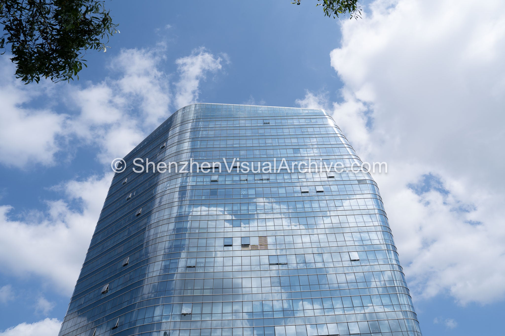 Monolithic Zenith: Upper Facade and Cloud Reflections at Nanshan iPark Tower (SVA-26-0155)